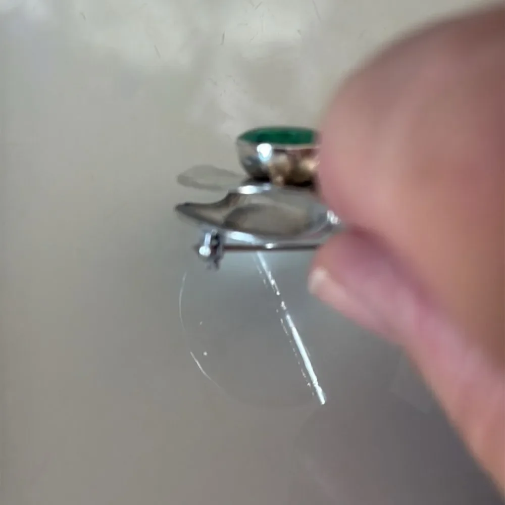 MCM sterling silver pin